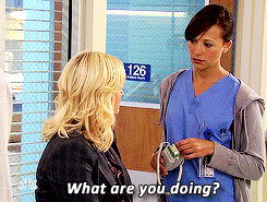 Ann: What are you doing? Leslie: cartwheels