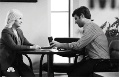 Ben gives Leslie a Knope 2012 badge
