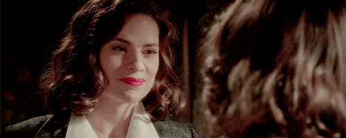 Peggy and Angie hug, then pull apart to regard one another.'