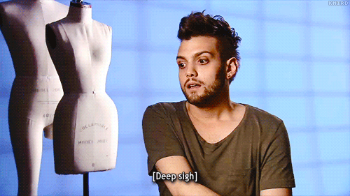 animated gif of a young man sighing