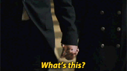 shot of Tiffany and Pat holding hands, text reads What's this?