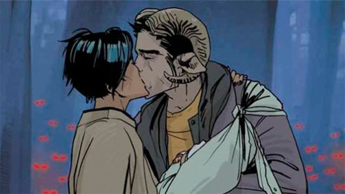 Alana and Marko kiss while Marko craddles Hazel in his arms