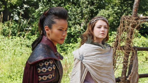 Mulan and Aurora stand side by side - Aurora appears to be looking at something while Mulan is thinking hard