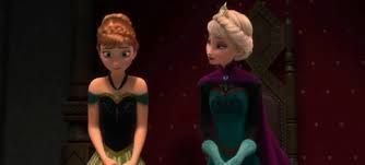 Anna and Elsa stand next to each other on coronation day