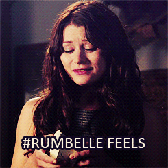 Gif shows Belle looking tearfully at her cup and text reads Rumpbelle feels