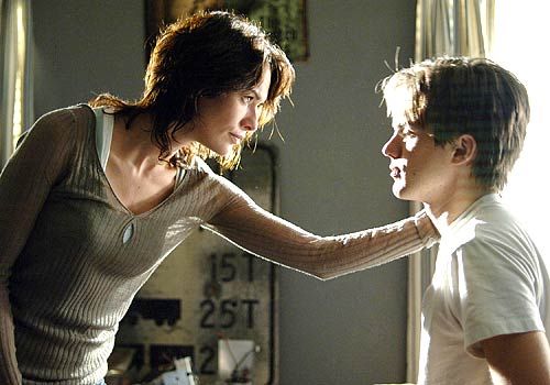 Sarah Connor & John Connor look at each other intensely