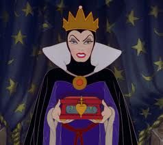 The queen from Snow White wears black and purple, with a long, high collared cloak pinned at the neck. Her neck and hair are covered in a black piece of clothing almost like a body stocking.