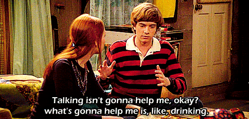 screenshot from That 70s show with text reading talking isn't going to help me. what's going to help me is, like, drinking