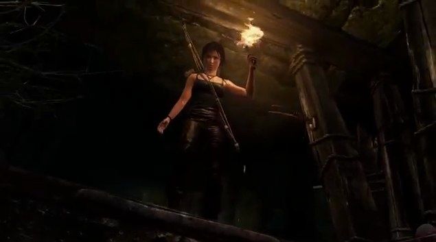 Lara looking down a dark hole