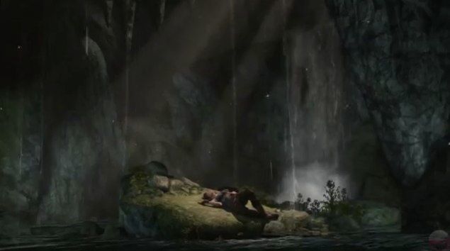 Lara lying in a cave